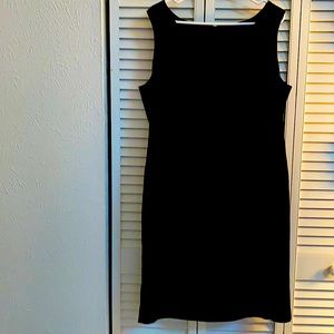 Gently worn square neck black sleeveless dress.